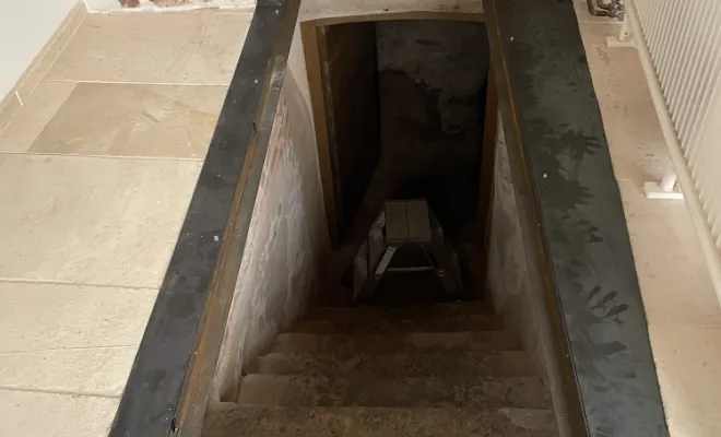 Conception, fabrication et pose d'une trappe en acier à Cahors