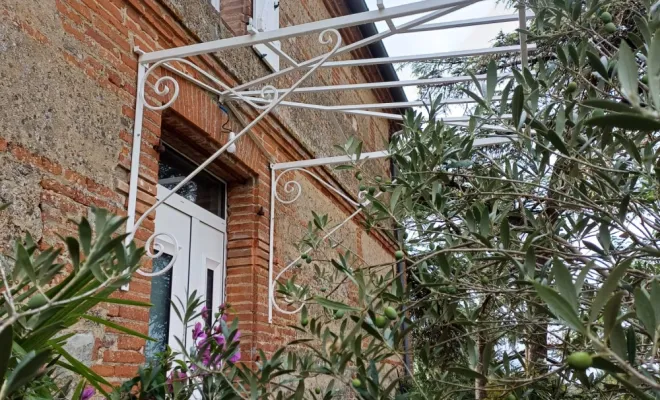 Conception, fabrication et pose d'une marquise à Castelsarrasin
